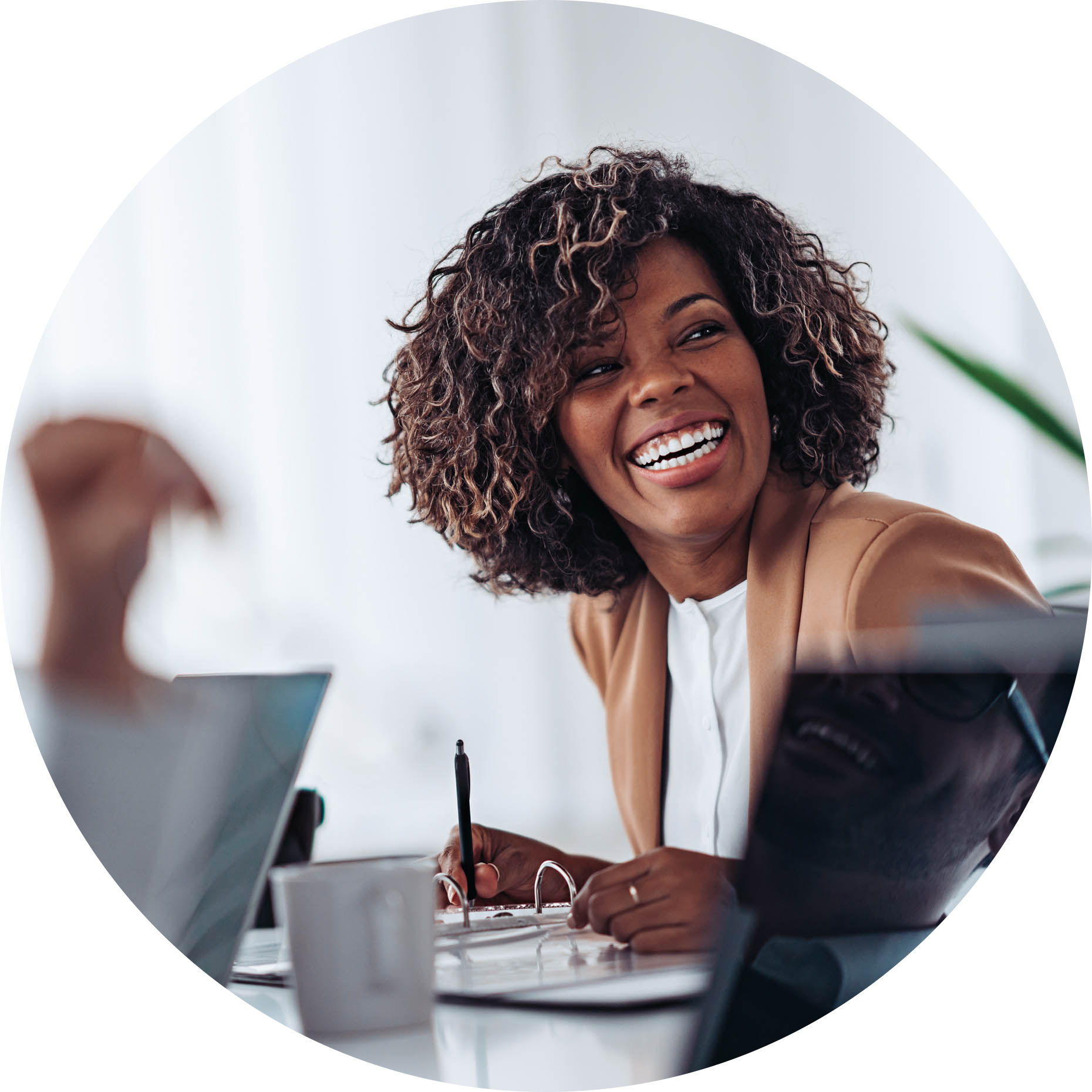 Business-013-Portrait-of-cheerful-businesswoman-smiling-at-the-meeting-circle.png