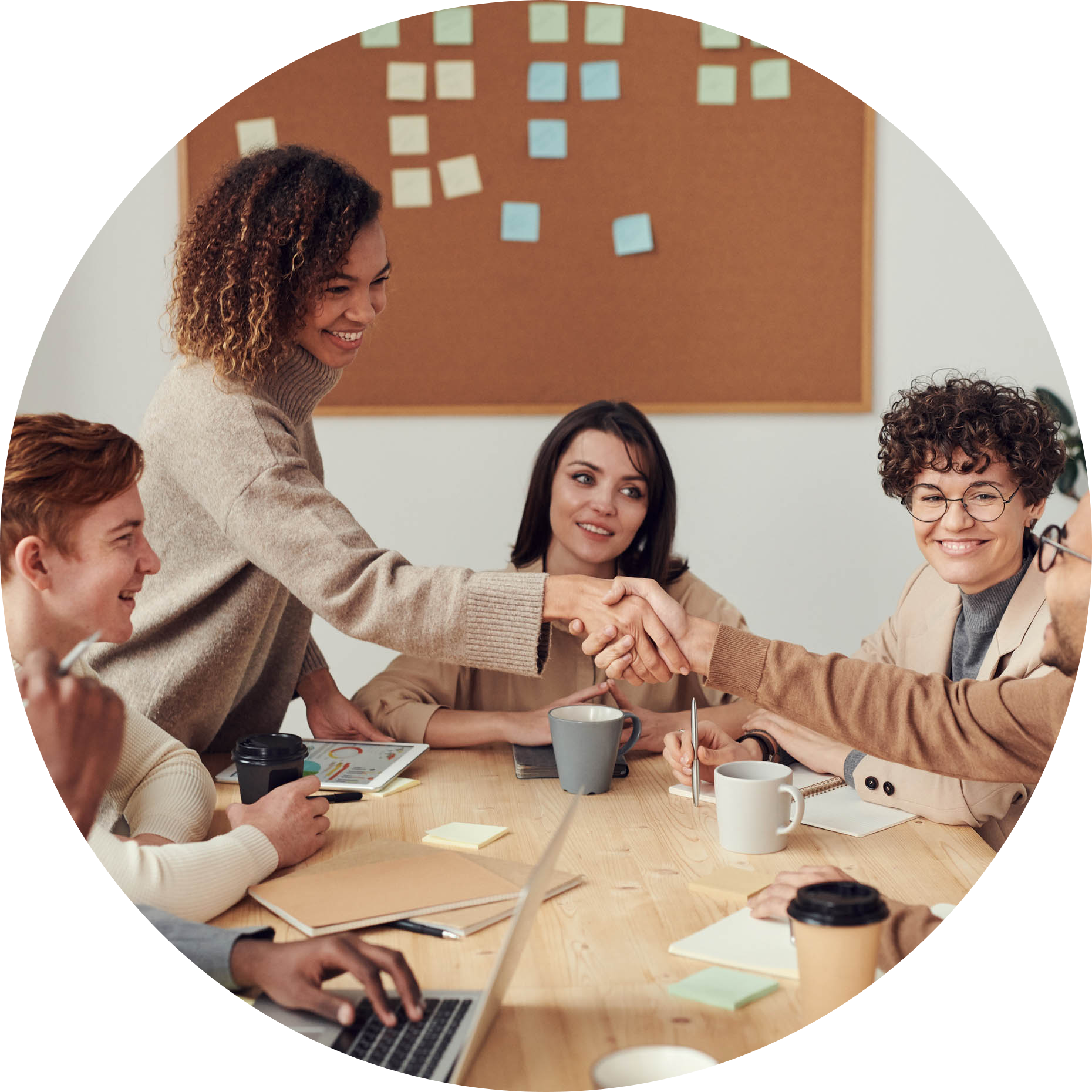Business-044-shaking-hands-across-table-circle.png