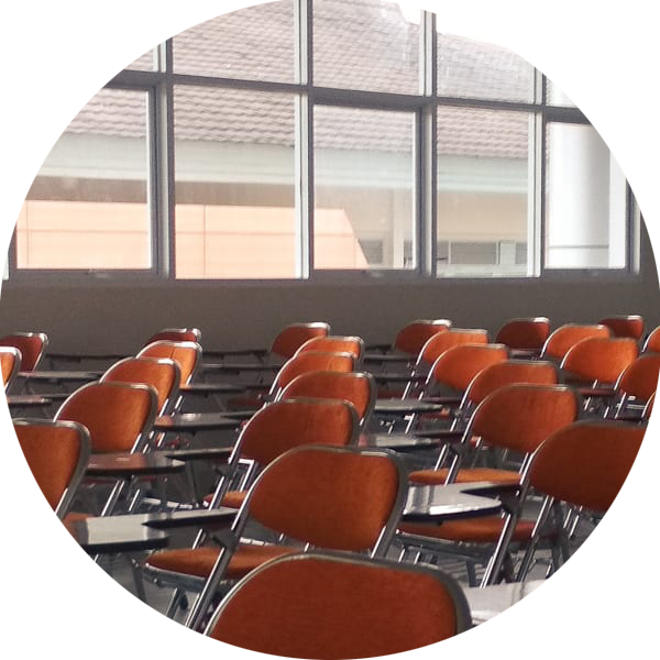 Image-Web-Empty-Classroom-orange-seats-600x600.png