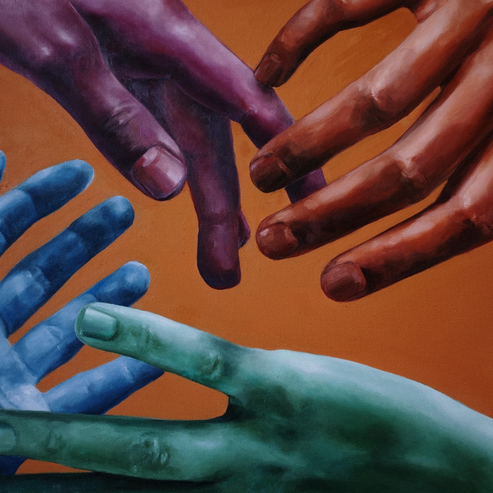 Image of multicolored hands